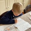 Writing a beautiful letter to one of the residents at our local care homes